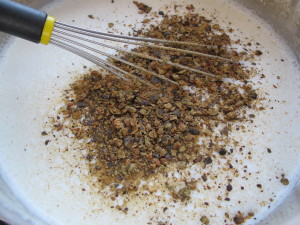 Crushed Juniper Berries Going Into Ice Cream Base